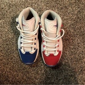 Red and blue Reebok AI’s